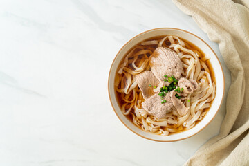 homemade udon noodles with pork in soy or shoyu soup