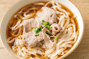 homemade udon noodles with pork in soy or shoyu soup