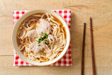 homemade udon noodles with pork in soy or shoyu soup