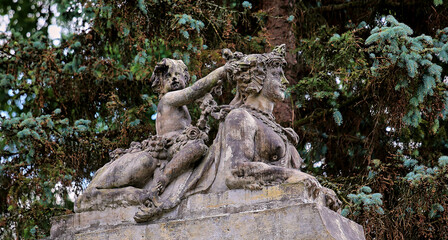 Fototapeta na wymiar A statue resembling a sphinx. Classical architecture.