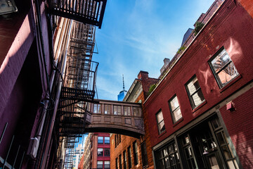 Low angle view of bridge on Staple Street in Tribeca in New York. Picturesque cityscape in Lower...