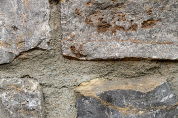 old stone wall background, closeup of surface