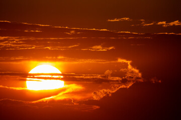 Dramatic contrasting sunset in the clouds