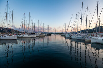 Naklejka na ściany i meble Marina yacht club on the European island of Sardinia at sunset