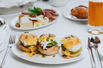 sandwich with salmon and  poached egg