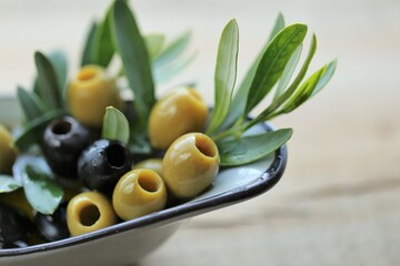  olives. Fresh organic green olives on a wooden table.Organic natural bio olives and olive oil