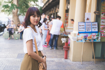 Portrait of Asian young woman  at street market in bangkok, Thailand.