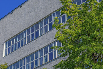 Fragment of the facade of an administrative building against the blue sky