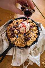 vegan cherry crumble in a skillet