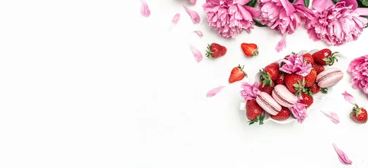 Keuken spatwand met foto Beautiful Pink Peony flowers sweet strawberry and macaron cookies dessert, on a white background. Banner, flyer, beautiful postcard, top view © Надія Коваль