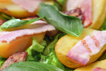 Hot salad meat and potatoes, basil, french mustard, bacon grill, lettuce leaf. Roasted potatoes...