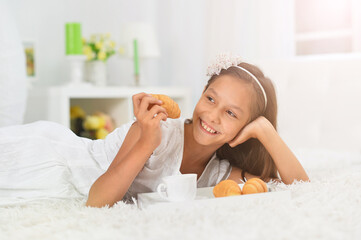 Emotional little girl  with breakfast