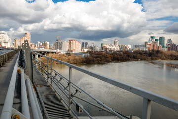  View from the Zhivopisny bridge in Moscow, Russia. It is the highest suspension bridge in Europe and landmark of Moscow. Nice panorama of modern buildings in Moscow.