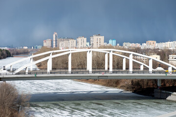 Naklejka premium View of the Khoroshevsky bridge on a spring day - a bridge across the Khoroshevskoe straightening of the Moskva River in the Serebryany Bor area. Connects Marshal Zhukov Avenue with Tamanskaya Street