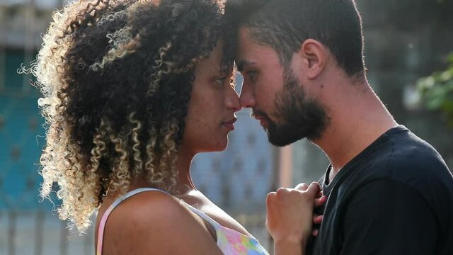 Happy latin couple. Candid joyful south american hispanic lovers