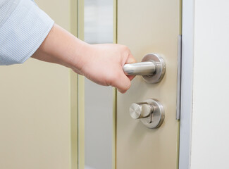 A hand to opening/close door knob, Home Security and Safety Background Concept