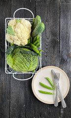Organic freshness cauliflower and Savoy cabbage, cucumbers, green peas, vegetables antioxidants high in vitamins, fiber food and nutrition