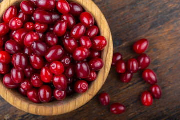 Dogwood berries in a wooden bowl
