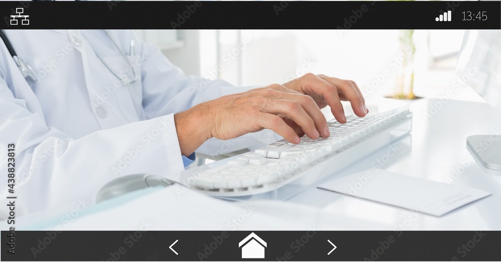 Poster composition of male doctor using computer on digital image interface screen