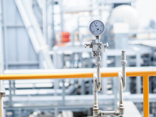 Pressure gauge of measuring instrument close up in industry zone at power plant with closed up