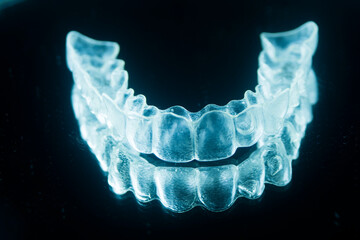Invisible bracket aligners
