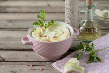 Еasy keto roasted cauliflower hummus comes together quickly with tahini, lemon juice, and roasted...