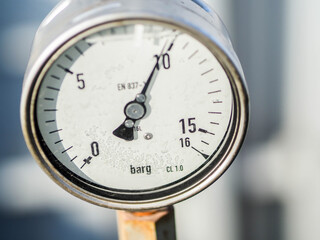 Pressure gauge of measuring instrument close up in industry zone at power plant with closed up