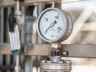 Pressure gauge of measuring instrument close up in industry zone at power plant