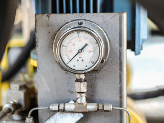 Pressure gauge of measuring instrument close up in industry zone at power plant with closed up