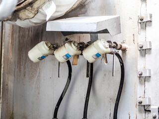 Temperature sensor for measuring instrument close up in industry zone at power plant.