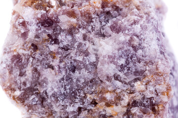 macro mineral lepidolite stone on a white background