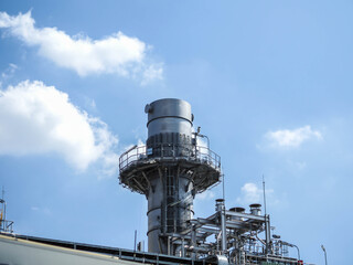 Stack and sky of Heat recovery steam generator in Combined-Cycle Co-Generation Power Plant.
