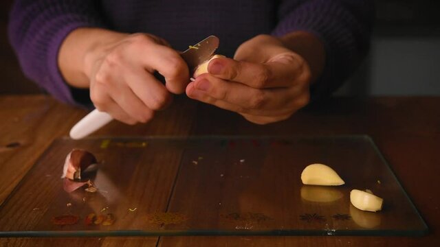 peeling garlic