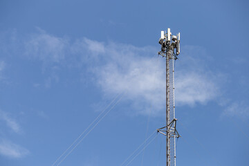 transmitter atop a cell phone pole About to be upgraded from 4g to 5g. High-risk electrical...