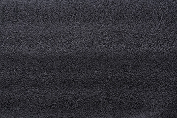 Fototapeta premium Close up pf texture of black sponge, background concept