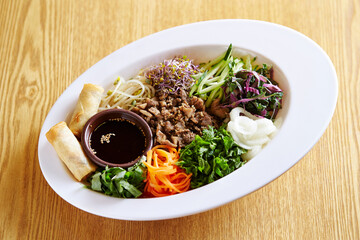 Various vegetables and grilled meat