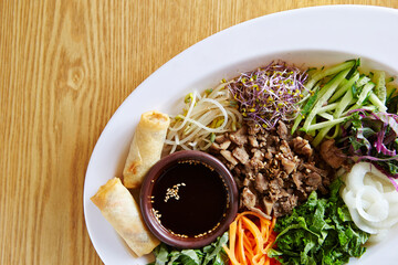 Various vegetables and grilled meat