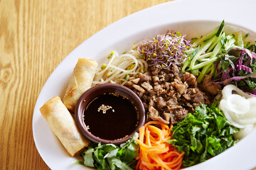 Various vegetables and grilled meat
