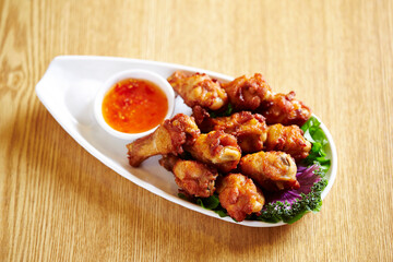 Grilled Chicken and Sauce on a Plate 