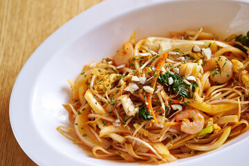 Fried noodles with various ingredients 