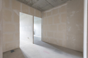 interior of the apartment without decoration in gray colors