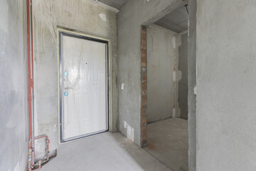 Fototapeta na wymiar interior of the apartment without decoration in gray colors