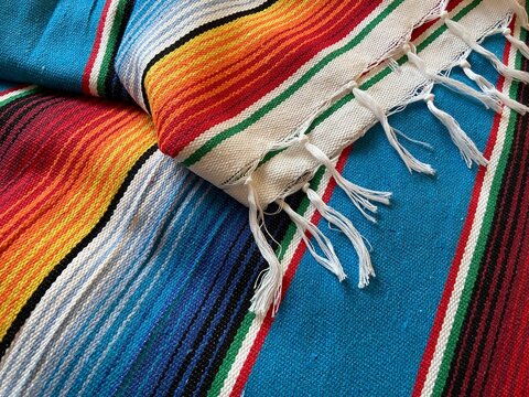 poncho background Cinco de mayo Mexican serape fiesta falsa pattern traditional culture blanket with stripes pattern copy space fabric textile material Mexican backdrop - stock photo photograph image
