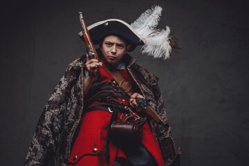 Angry child with jacket weared in pirate costume