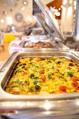 potato and vegetable casserole in a metal plate