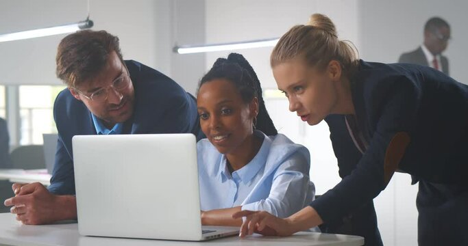 Group of diverse business people working in office and discussing new ideas