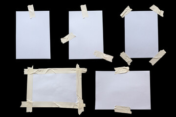 Variety of white paper stuck with sticky tape isolated on a white background.