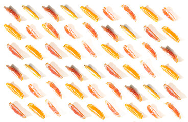 Texture and Pattern from chopped fruit oranges and grapefruits isolated on a white background