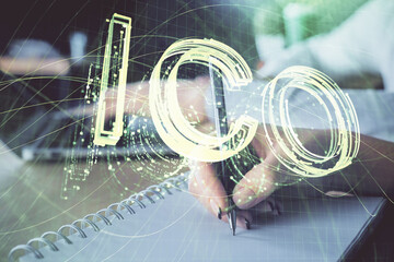 Double exposure of blockchain theme drawing over people taking notes background. Concept of...