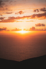Golden sunset behind the clouds in Jaizkibel, Basque Country